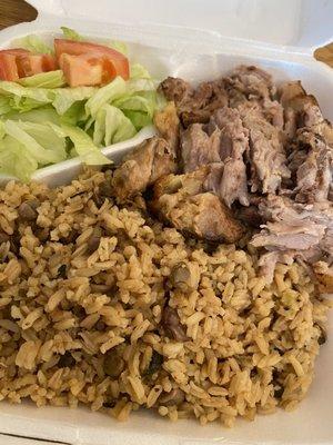 Dominican Moro with pernil and green salad combo plate.