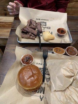 BBQ brisket & pork sandwich with waffle fries and fried onion rings. Amazing!!!