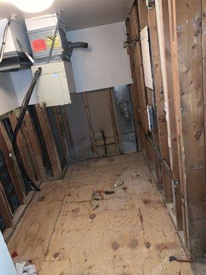 Unfinished furnace/laundry room since June