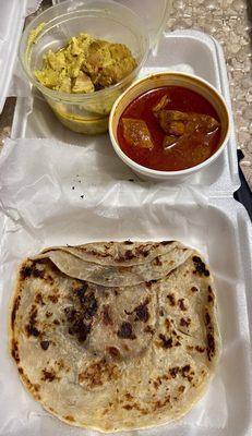 Chicken Rendang and Roti Canai with Chicken curry dipping sauce. Very, very good.  Trying new foods, this is a winner