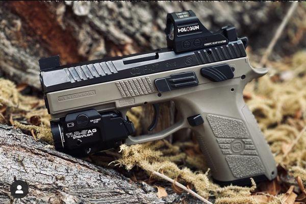 Cz P07 by Freedom Firearms! Awesome Staff  Added a Holosun red dot and TLR 8G laser/Light