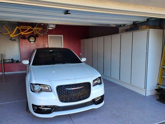 The car goes well with the cabinets