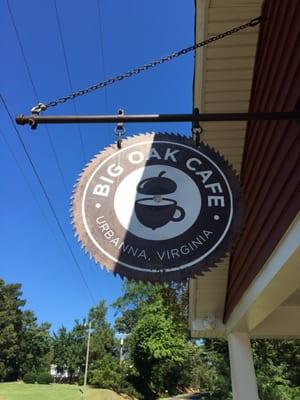 Big Oak Cafe sign on a rusty saw blade