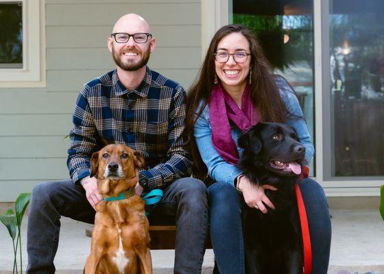 Drs. Erica lozoya and Brian Hayes hanging at the house with their two dogs Rue and Bear.