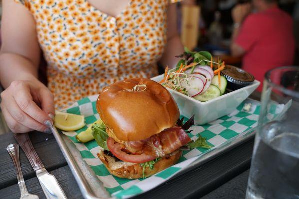 Bacon fish burger with side salad