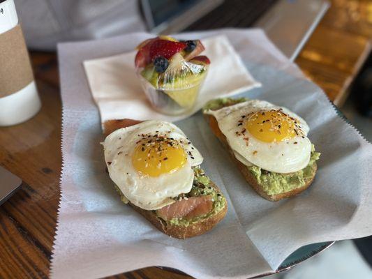 Avocado with salmon and over easy egg