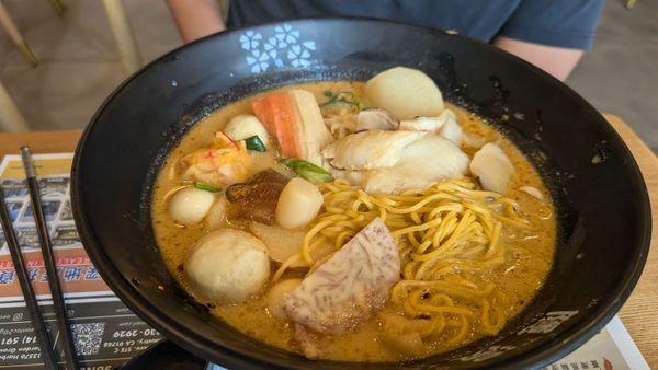 Build Your Own hot pot bowl: Mild house broth with beef, seafood, and veggies