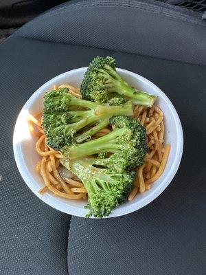 Bowl of chowmaine and 4 broccoli's