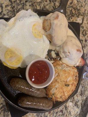 Biscuits and gravy with a side of sausage