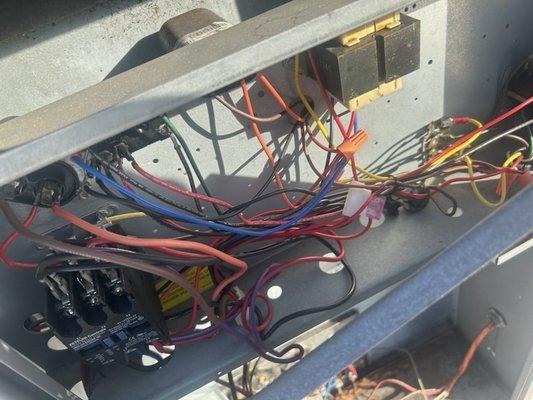 Panels not put back, electrical wires dangerously exposed