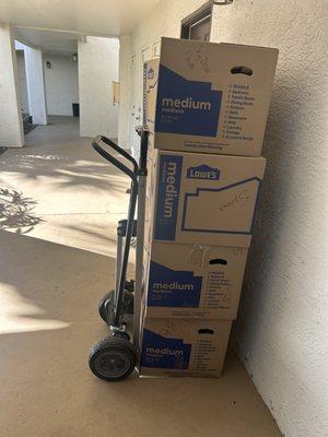 Moving boxes  with hand truck.