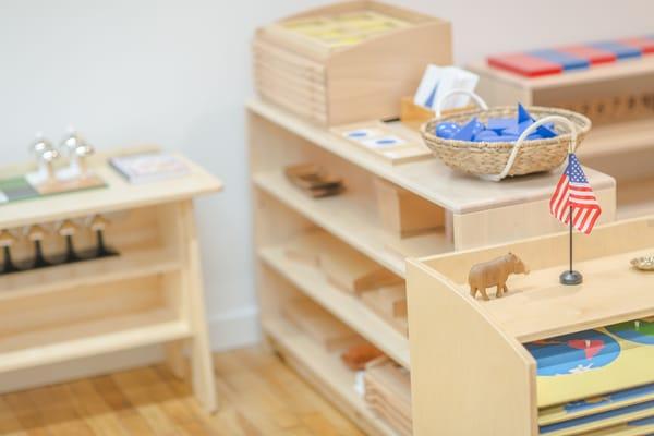 Primary classroom shelves with lessons