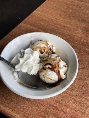 Chocolate syrup with ice cream & whipped cream