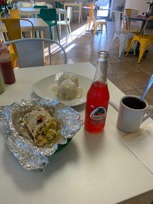 Coffee, Mexican carbonated fruit punch, biscuits and gravy and a breakfast burrito with bacon, cheese, potato and egg.