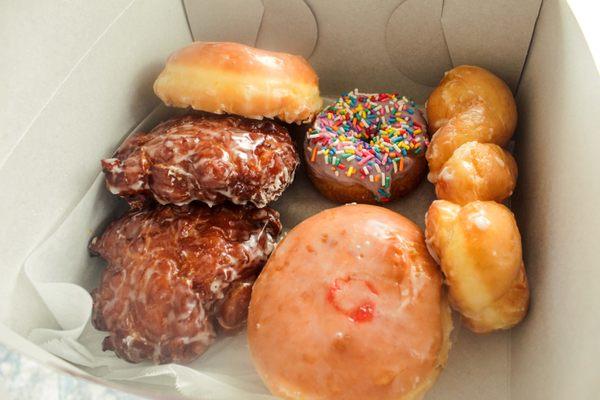 Blueberry frosted donut w/ sprinkles, twisted glaze, regular glaze, jelly-filled glaze & two apple fritters-  my friends and I loved them!!!