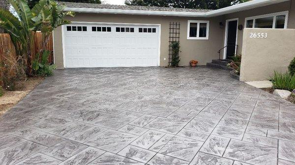 Stamped concrete driveway in a modern grey toned color