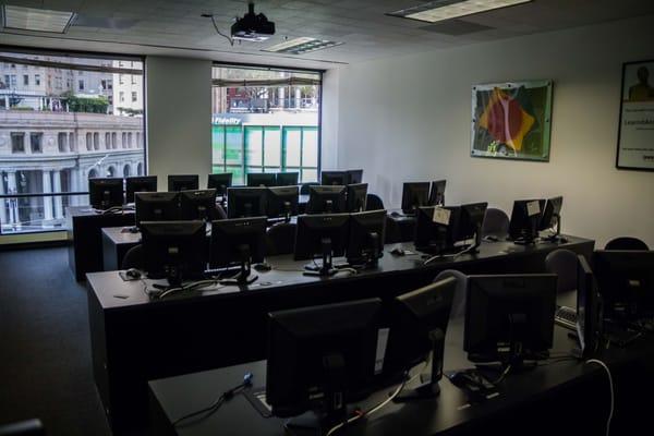 One of the Learn iT! classrooms with windows facing Market Street in the Financial District of San Francisco.