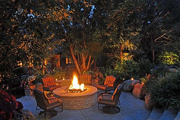 Outdoor fire pits and fire places bring warm to the outdoors in cooler months and create a natural gathering place.