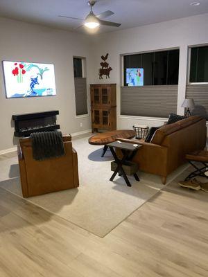 Our new living room with motorized duets by Hunter Douglas.