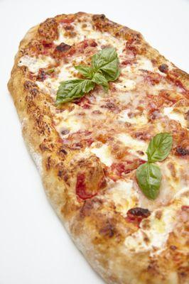 Pizza Romano - parbaked and frozen at the peak of freshness.  Take one home today.