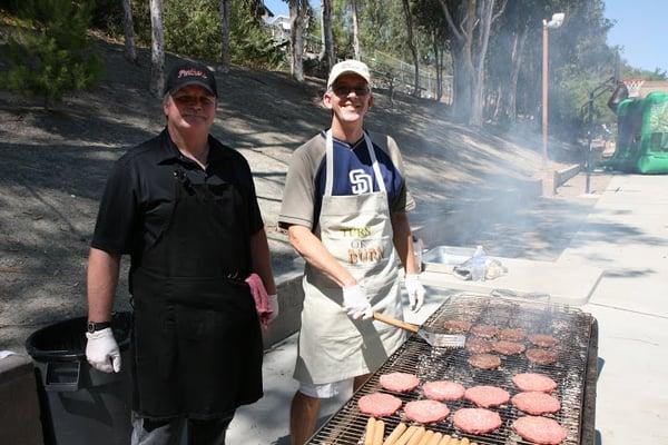 Men of the parish grilling for a picnic