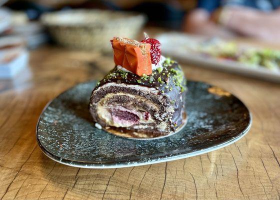 Slice of exquisite chocolate strawberry cream cake