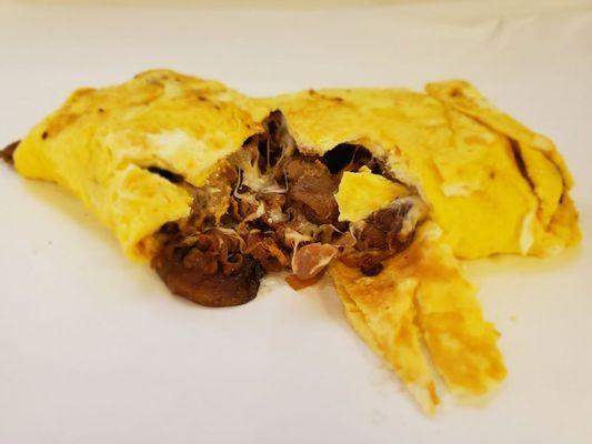 Steak Bomb Omelet. We also make this yumminess in a sandwich and wrap. Once you try it is difficult to forget it.