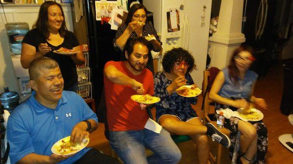 Family eating tacos de Canasta from FLACOTACO