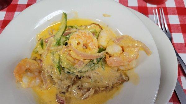 Open face shrimp & crab with cream sauce. Tasty!