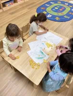 Kids making corns