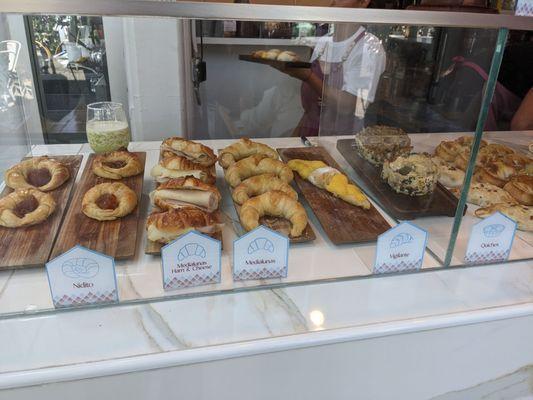 Display case with sweet and savory options.