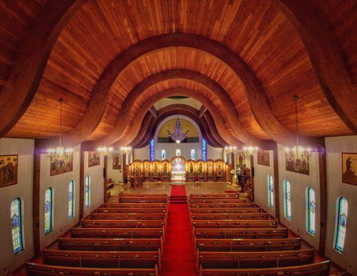 Taken from the choir loft showcasing the curved wooden ceiling