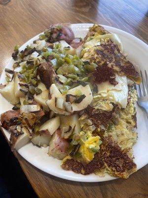 Cheese and green pepper Omelet with "home fries"