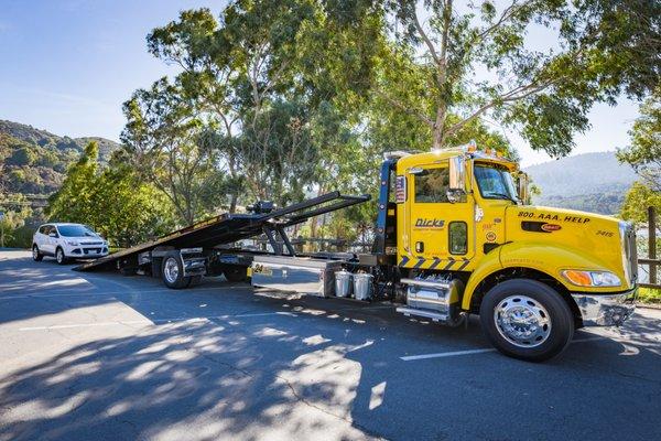 Now offering both flat bed and wheel lift medium duty towing!