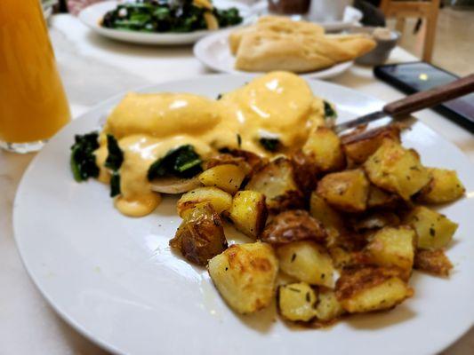 Eggs bennie a la spinach, with lovingly tasty fried potatoes.