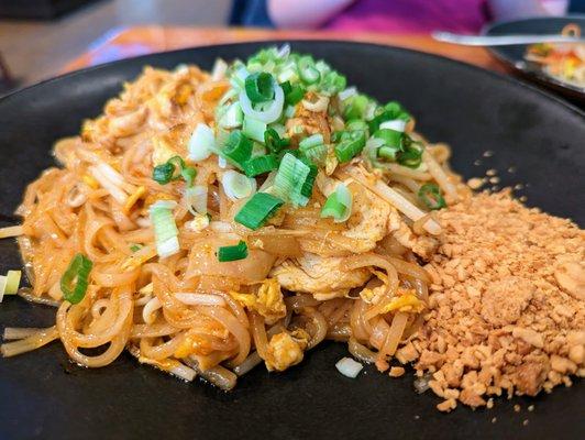 N1. Pad Thai with Chicken. $13. Pan-fried rice noodles, egg, bean sprouts, scallions, ground peanuts, and "Bk54 seasonings."