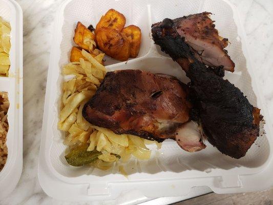 Jerk chicken, cabbage and plantains.