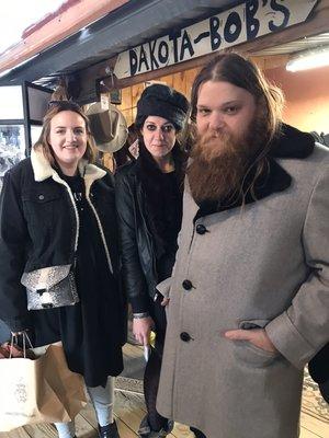 Visitors snap up a vintage Pendleton overcoat.