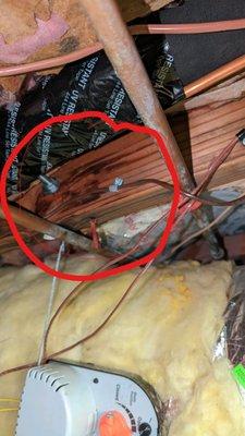 Circled area is the wet portion of beam from leak.