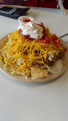 Lunch special, taco salad with sour cream & Salsa. It was Super good and affordable at $6.00