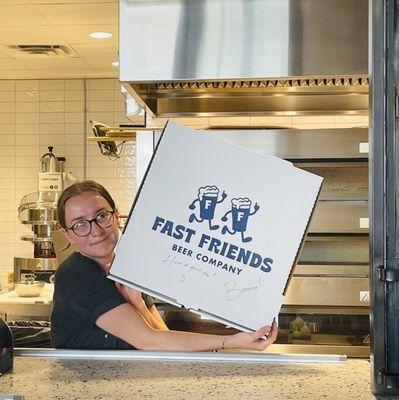 Mary making delicious Pizza at Fast Friends Brewery