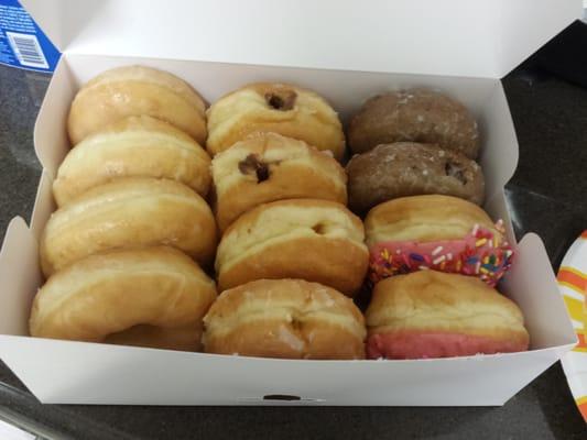 Pictured here is their original glazed, chocolate filled,  Bavarian cream filled and glazed blueberry cake donuts.