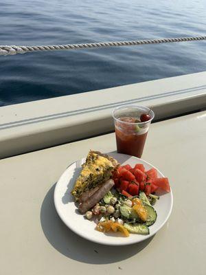 Broccoli quiche, sausage links, chickpea and cucumber salad, watermelon with mint, and a killer Bloody Mary