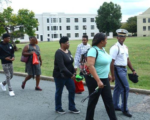 Prospective families take an admissions tour of campus