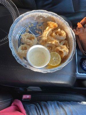 What's left of my fried calamari to go with ranch dressing. It comes with marinara sauce but we substituted ranch.