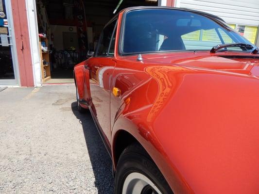 What a shine! Following our multi-step Sanding, Compounding, and Polishing of this Beautiful 1983 Porsche!