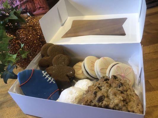 Choc dipped Gingerbread boys, cut-out, raspberry sandwich cookies, Mexican wedding cake, oatmeal raisin (not a loser in the box)