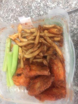 Frank's red hot chicken wings and fries