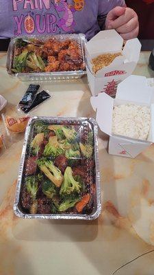 Beef broccoli dinner and lovers chicken with chicken broccoli (both come with choice of white or fried rice)