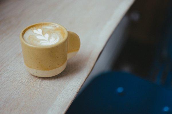 Cortado in little mug by local pottery shop